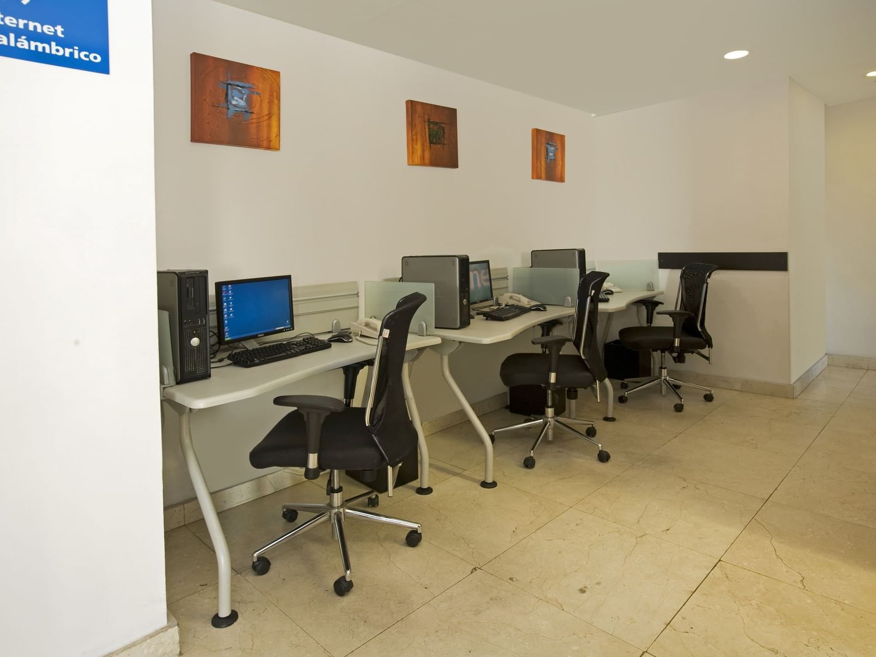 Separated workstations in a business center at One Hotels