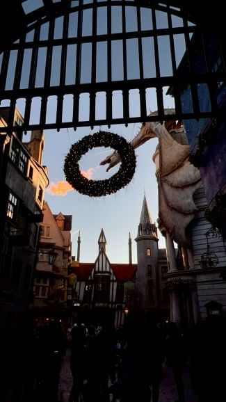 Diagon Alley is festively decorated for Christmas at Universal Orlando. 