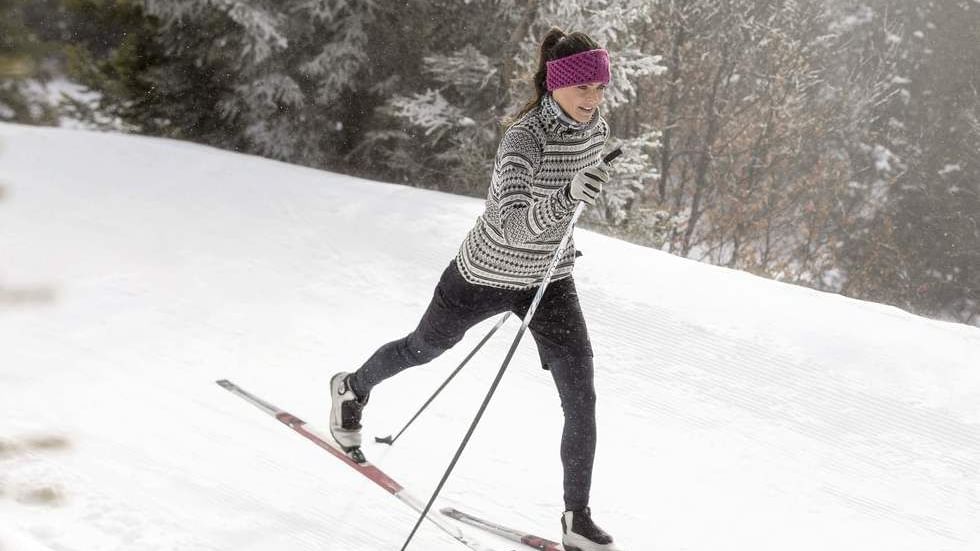 Girl doing cross-country skiing near Falkensteiner Hotel & Spa Carinzia