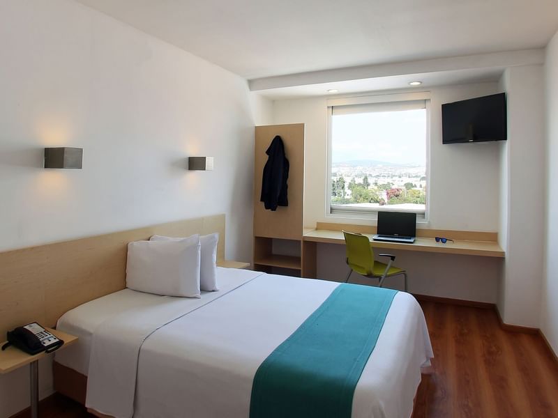 Habitación Superior con ventanas abiertas en One Hotels