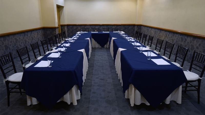 Meeting room with u-shaped table set-up at Gamma Hotels