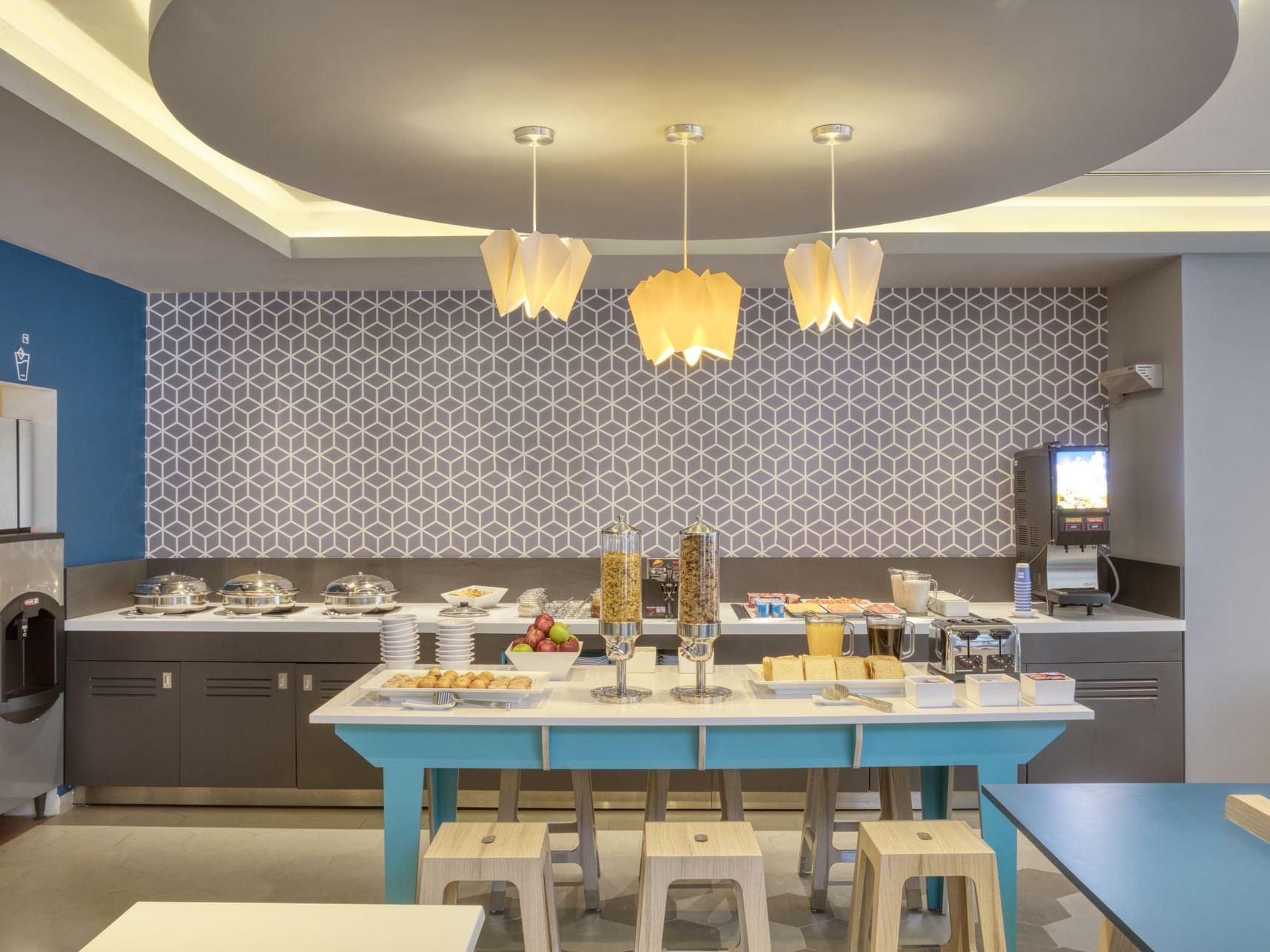 Cereal containers placed on a breakfast buffet at One Hotels