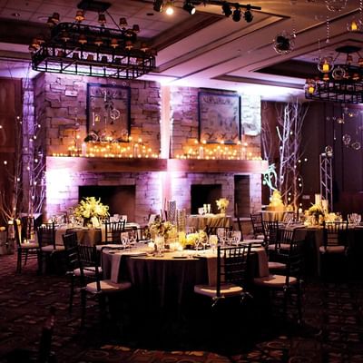 Candles & flower decor in a wedding reception at Stein Eriksen Lodge