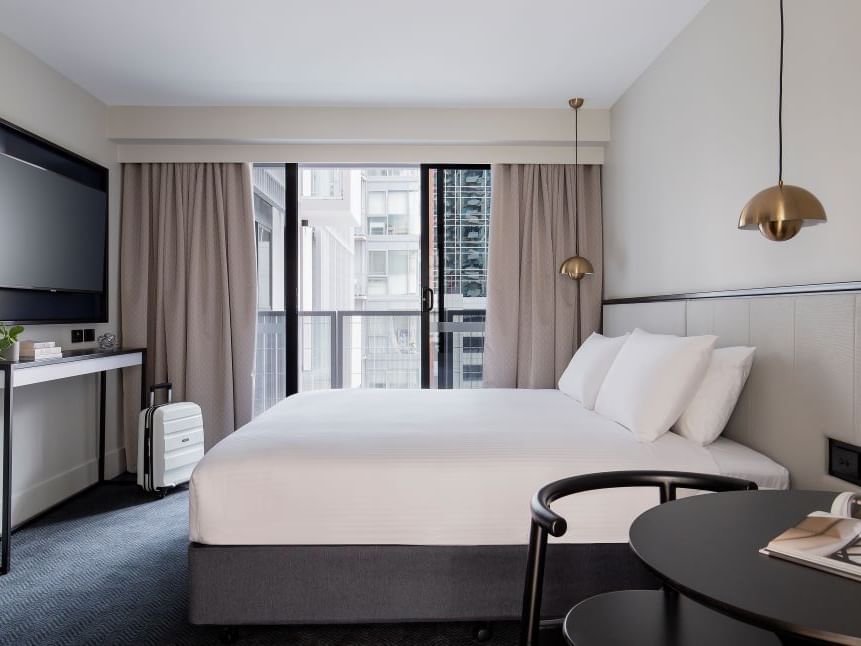 Bedroom with balcony in Studio Apartment at Brady Hotels Jones Lane