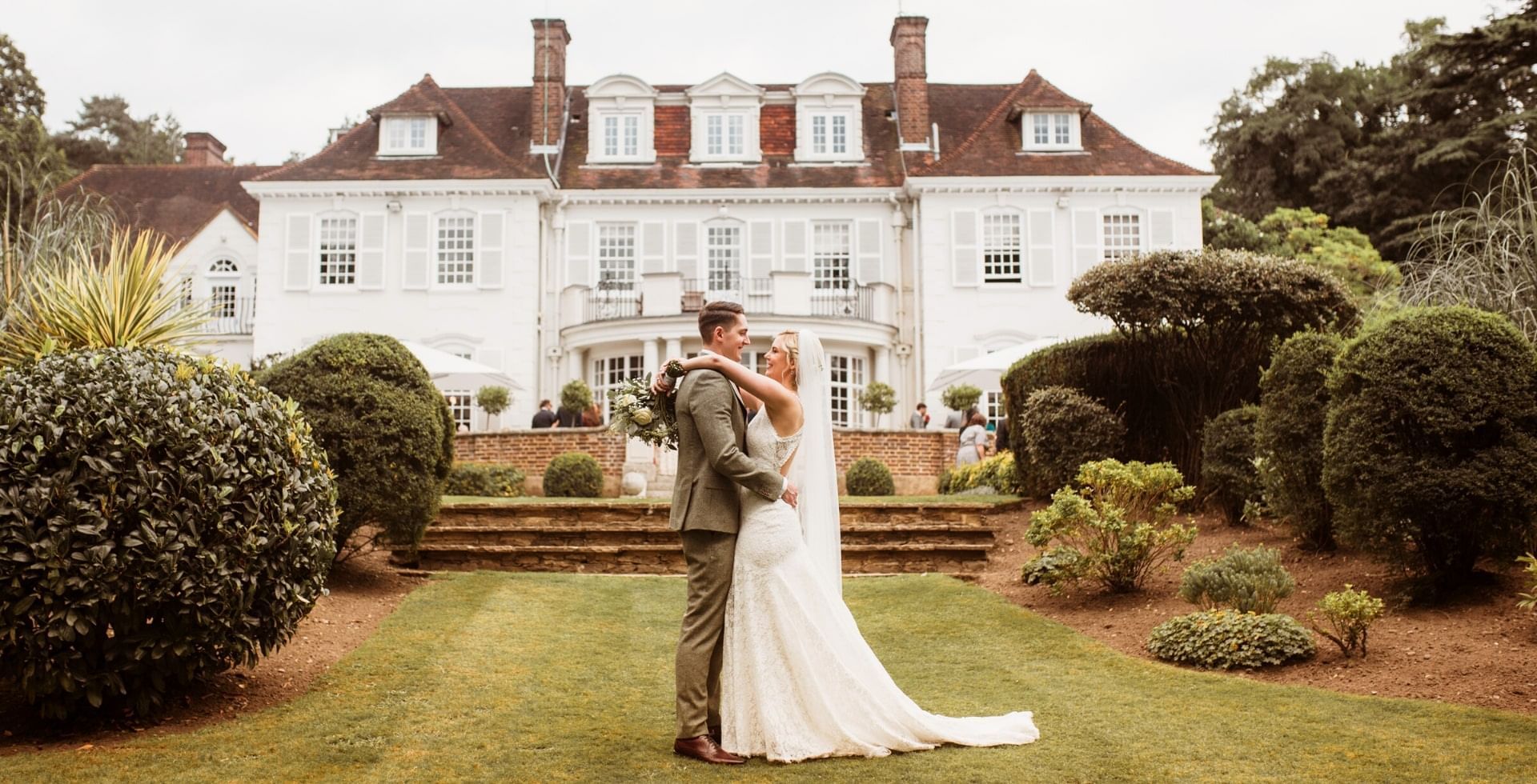 A wedding couple in front of the Gorse Hill