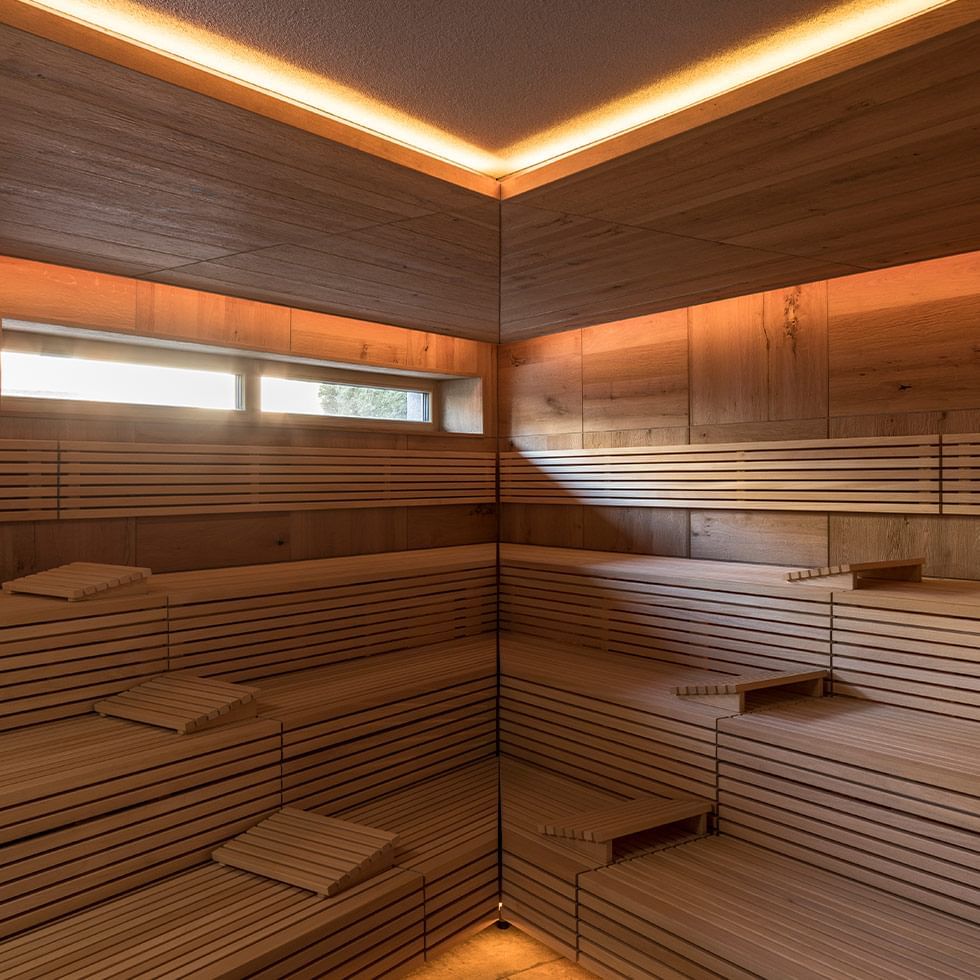 The wooden interior of a Sauna at Falkensteiner Hotels
