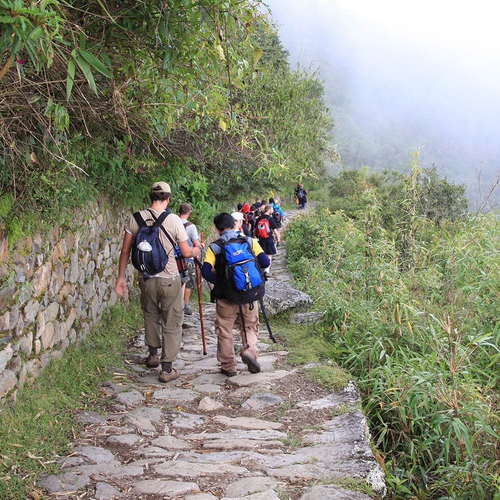 Tourists in the Inca Trail to Machu Picchu near Hotel Sumaq
