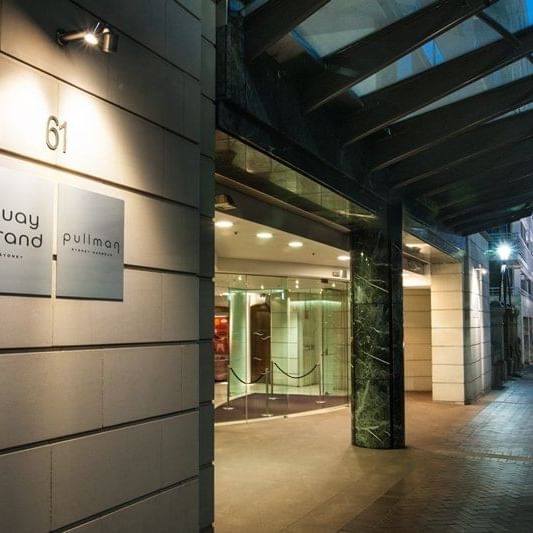 Entrance sign of hotel at Pullman Quay Grand Sydney Harbour