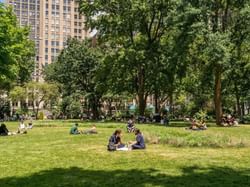 People lounging in Parque la Florida near Hotel Factory Green