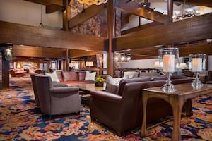 Interior of lobby area with lounges at Stein Eriksen Lodge