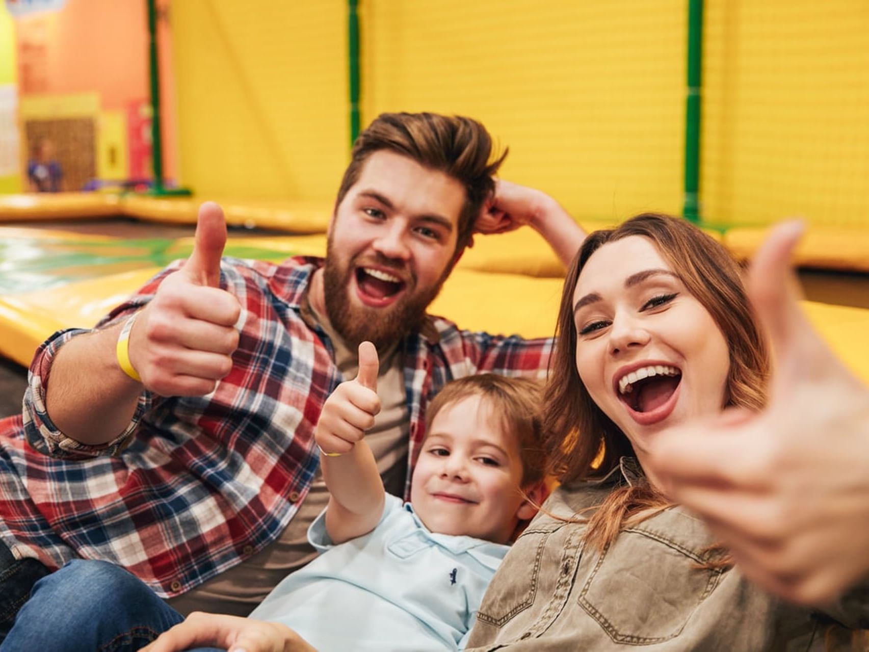 Portrait of a family in kids area at MCM Elegante Beaumont