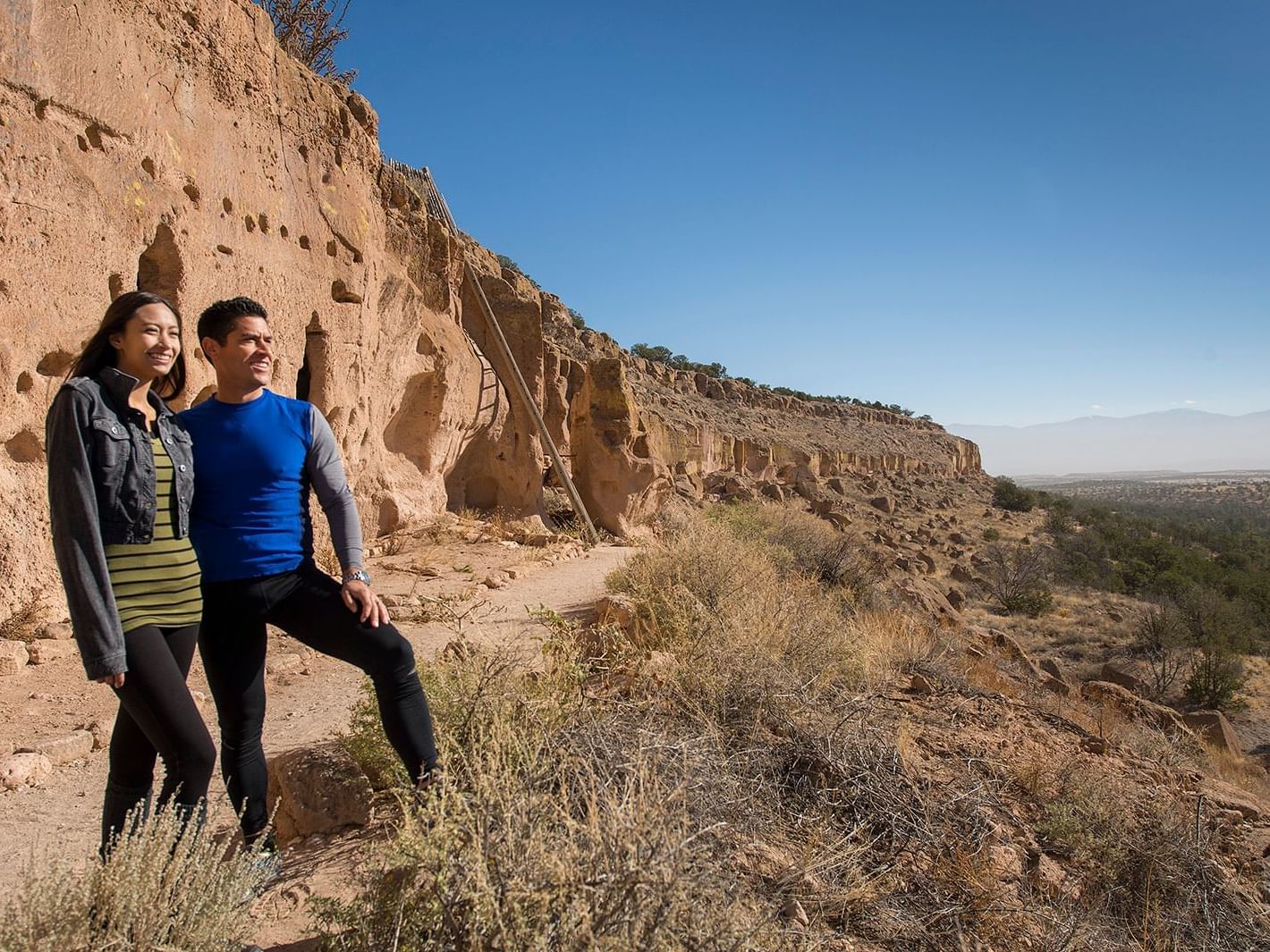 A couple at Puye Cliff Dwellings near Santa Claran Hotel Casino