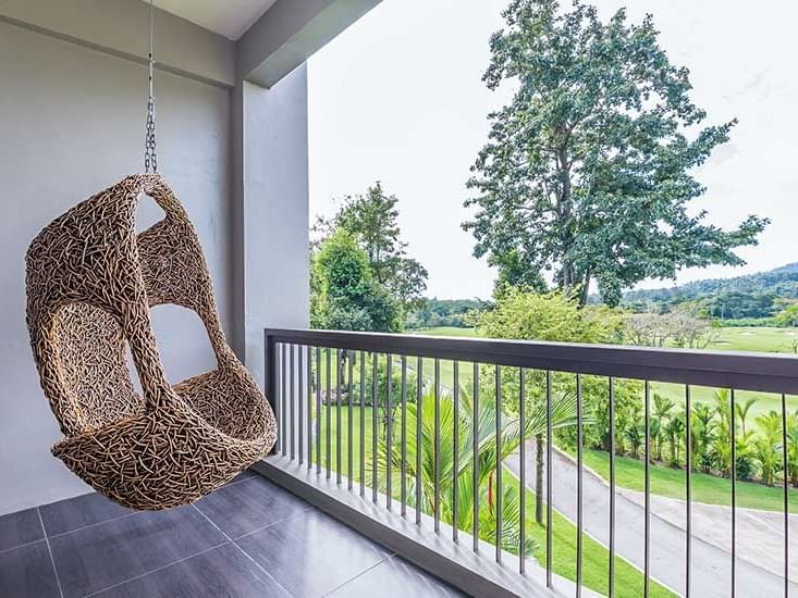 Swing chair in Mountain View Room at Chatrium Golf Soi Dao