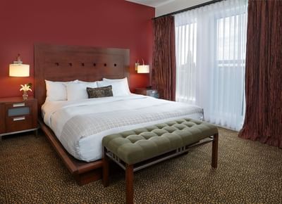 King Suite bedroom with a king bed at Metterra Hotel on Whyte