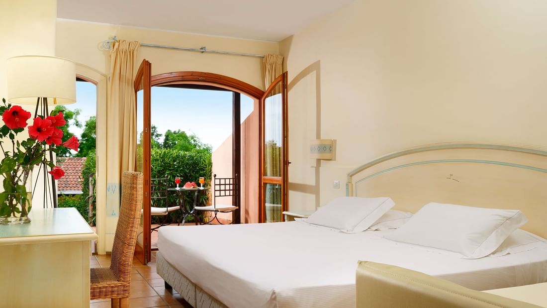 Superior Room, large bed & balcony at Falkensteiner Hotels