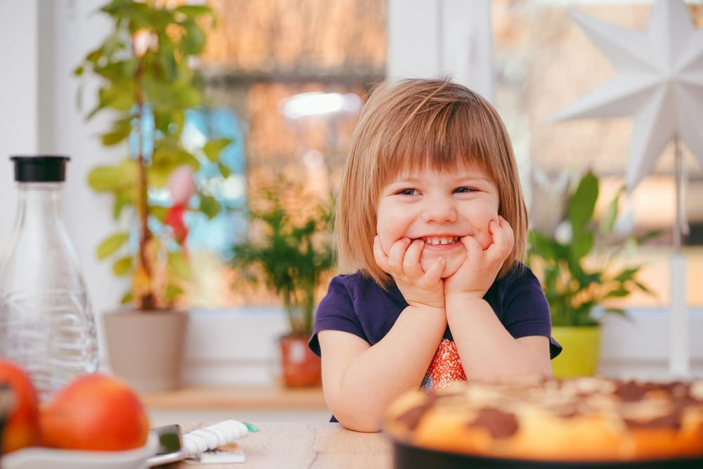 Child enjoying a creative activity