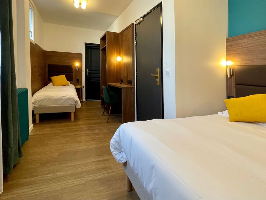 Room with king & single beds at The Originals Hotels