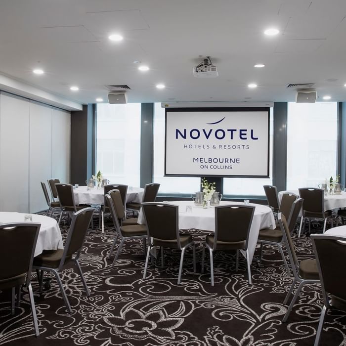 Banquet tables setup for meeting at Novotel Melbourne on Collin