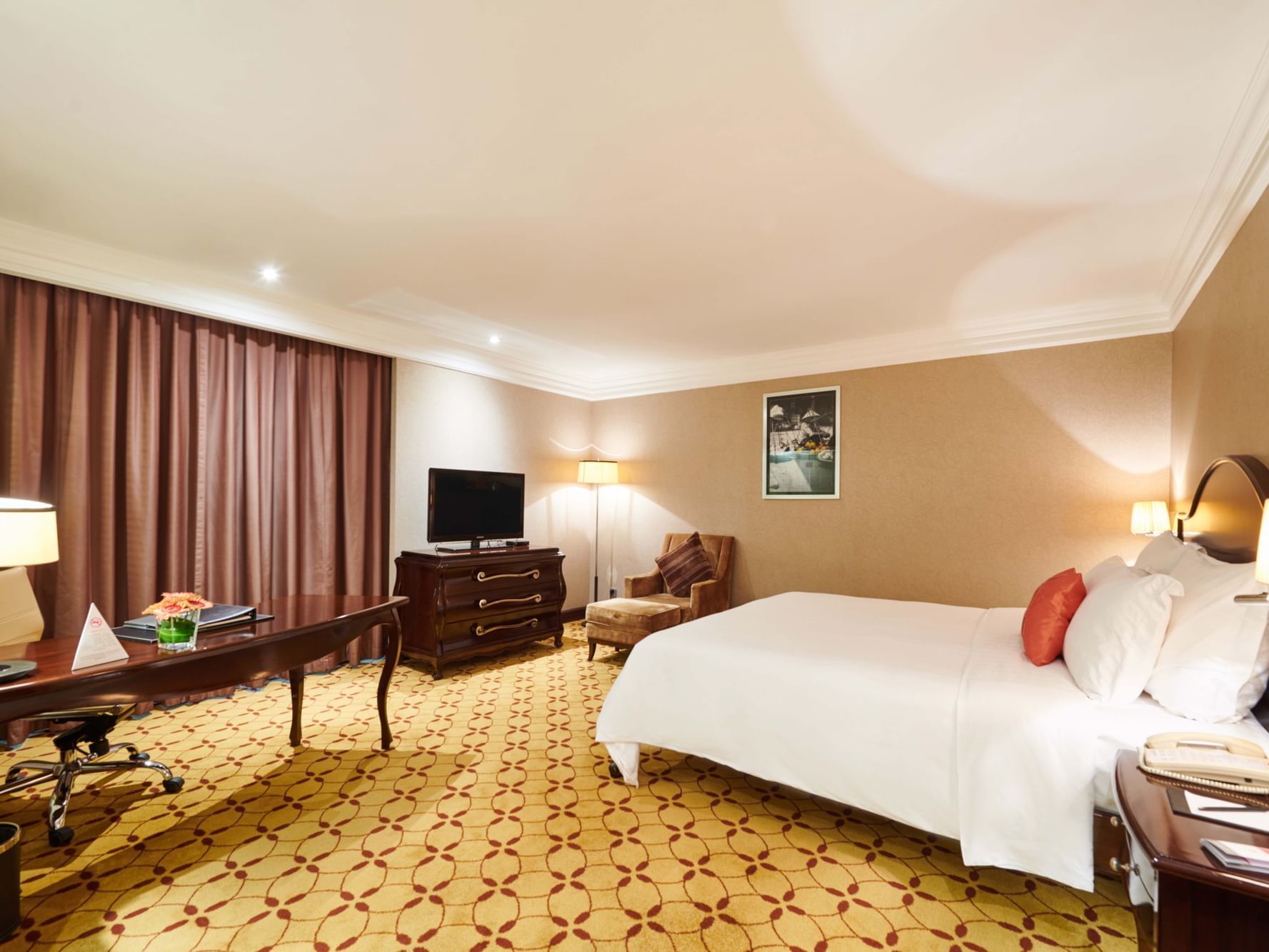 Premium Deluxe Room with a king size bed, TV & a working desk at Eastin Grand Hotel Saigon