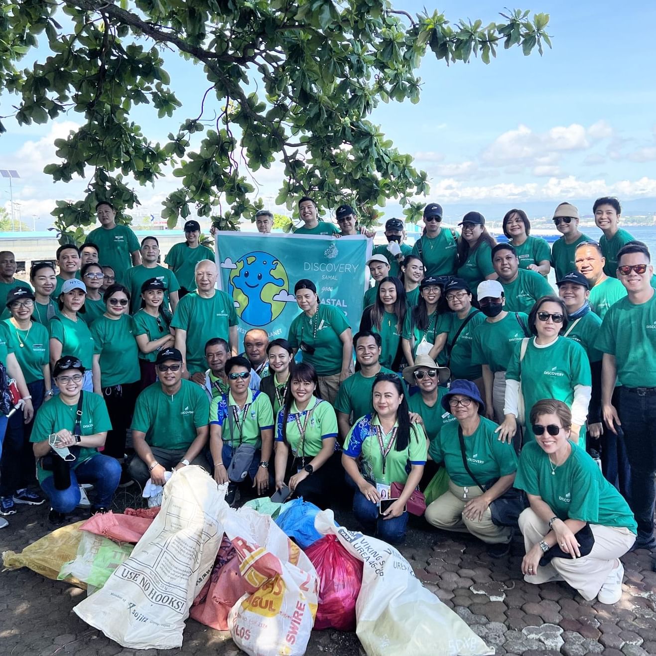 Discovery Samal team photo during coastal cleanup