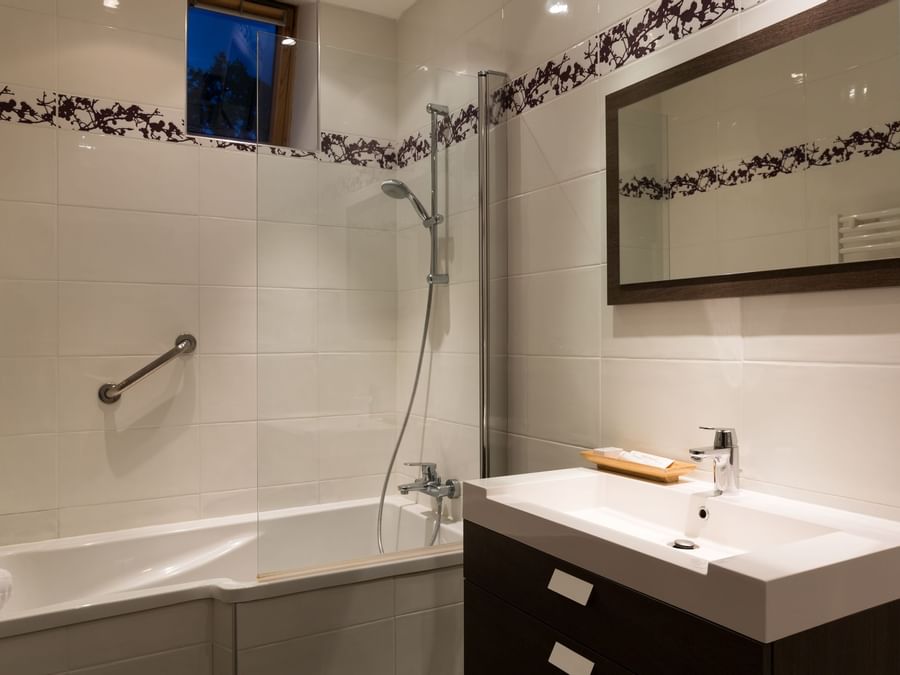 Bathroom vanity in room at Chateau de Beaulieu et Magnolia Spa