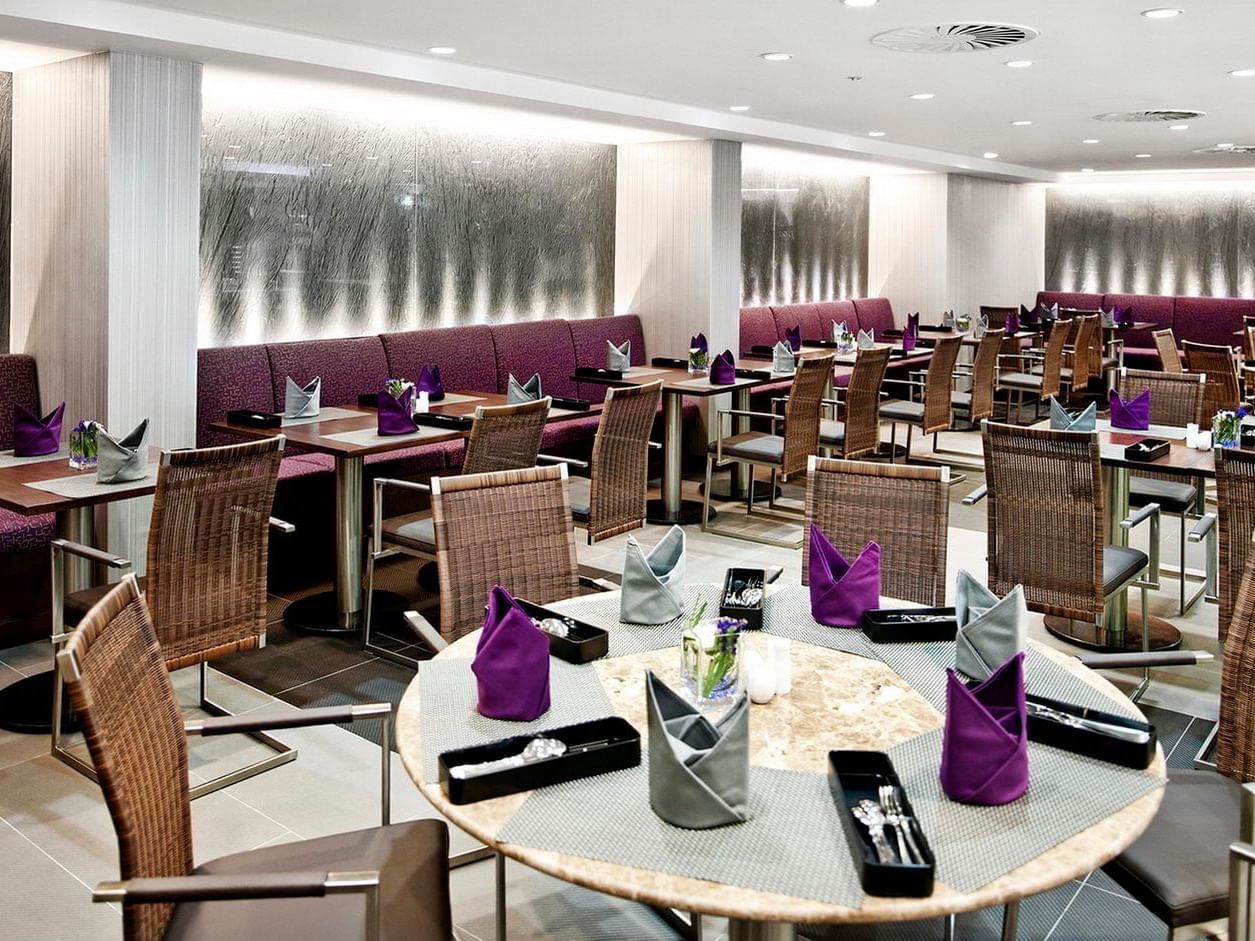 Café Saigon dining area arranged with cutlery at Eastin Grand Hotel Saigon