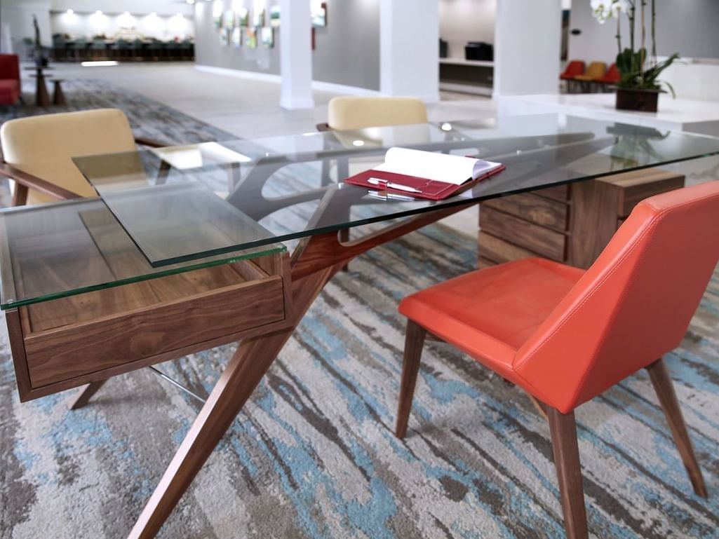 Book on a glass desk in Business Center at The Anaheim Hotel