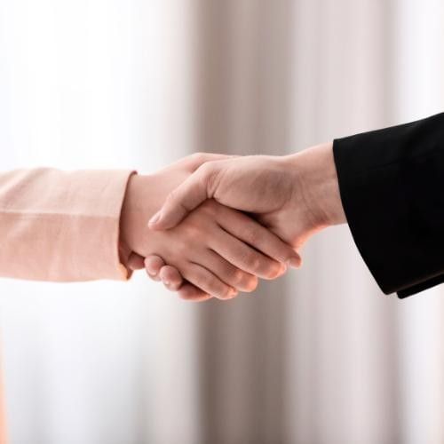 Person shaking hands with Sales Team at Easthampstead Park, one of the best Berkshire Retirement Party Venues