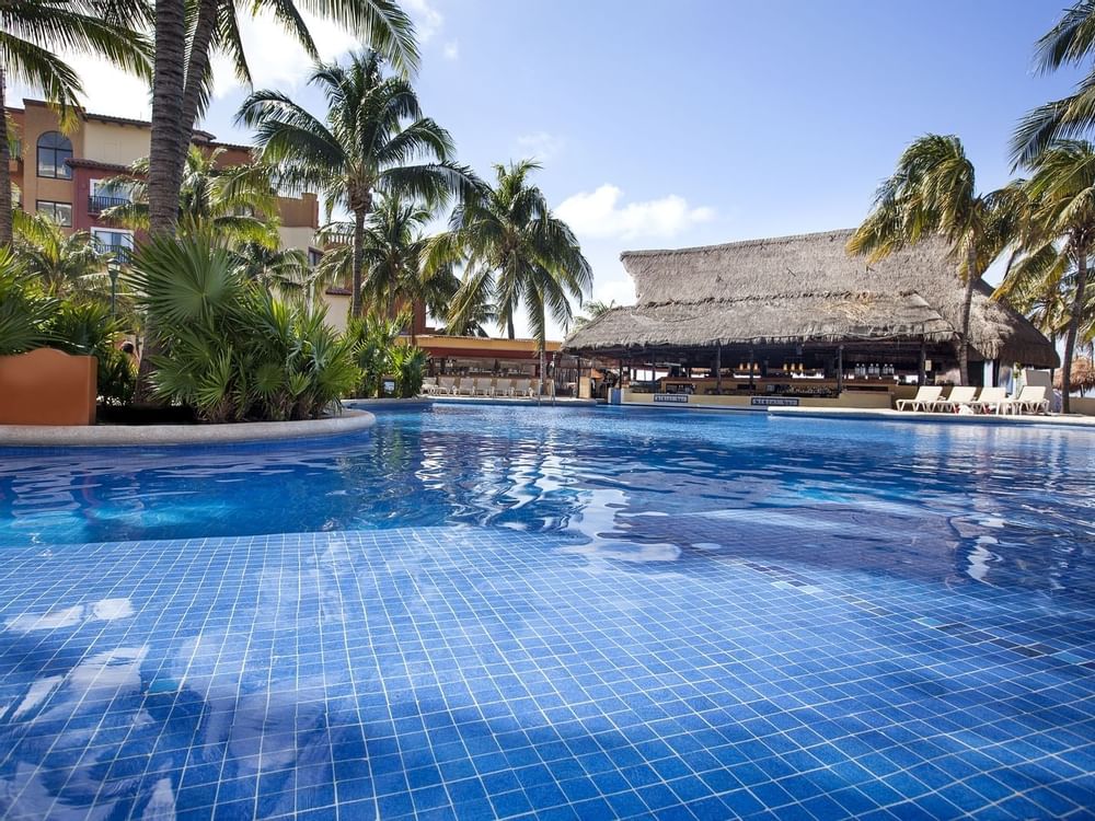 Pool along with bar at FIESTA AMERICANA CONDESA CANCÚN