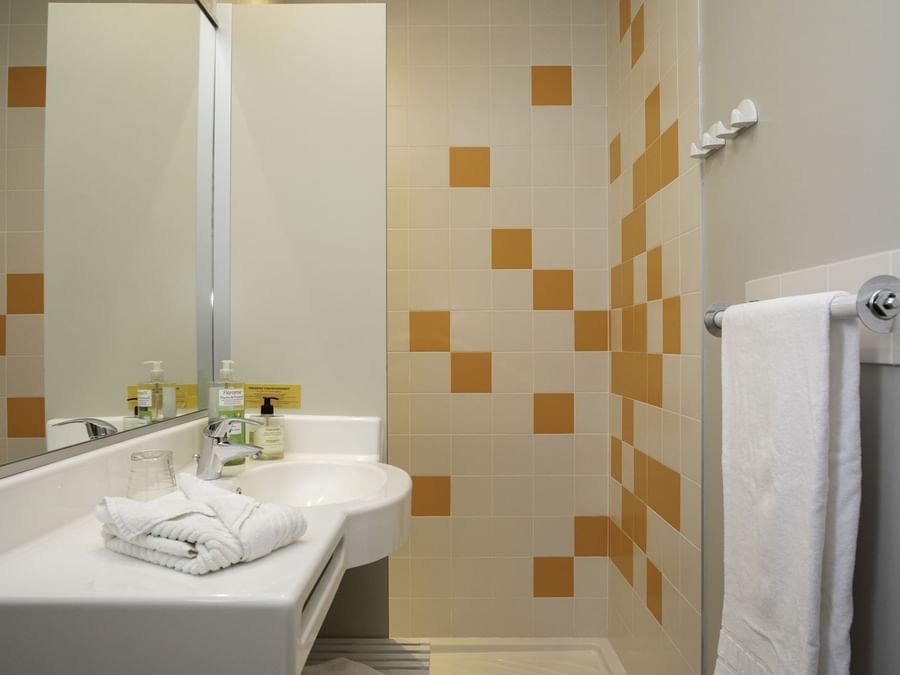 Bathroom in comfort room at The Originals Hotels