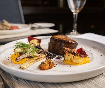 A plate of beef & reef dish at Hotel Emperador Buenos Aires