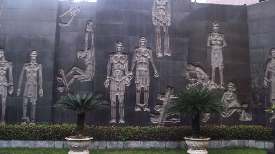 Carvings of prisoners on the walls in Hoa Lo Prison near Sunway Hotel Hanoi