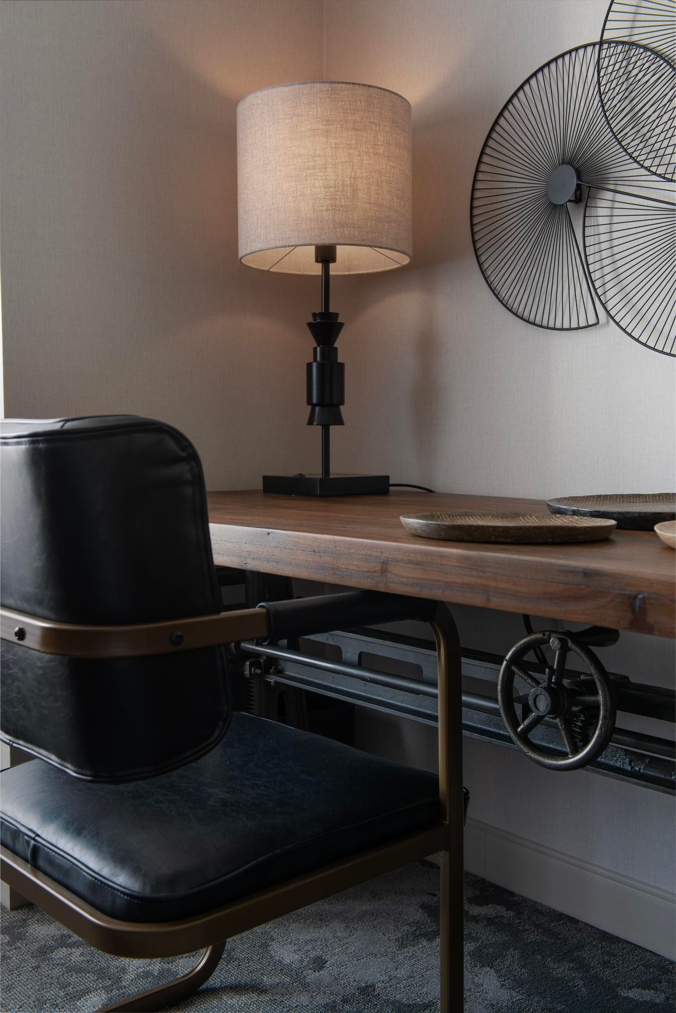 Work desk with a lamp & Wall decor in King Room at The Artisan Hotel at Tuscan Village