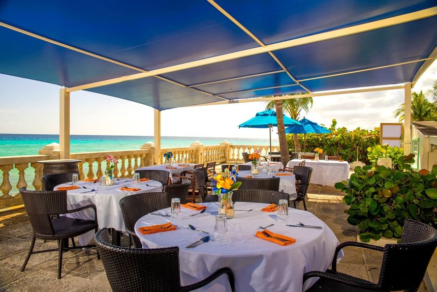 Dining area with sea view in Sea Grape Bar & Restaurant at Dover Beach Hotel