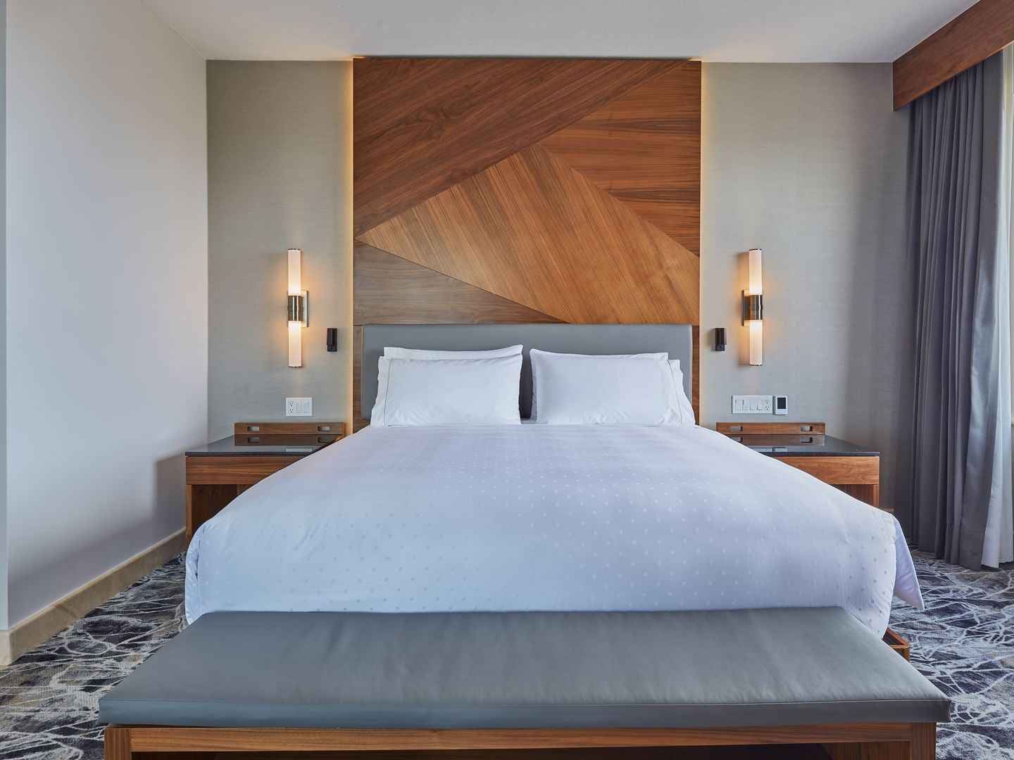 King bed & stool in Master Suite at Grand Fiesta Americana
