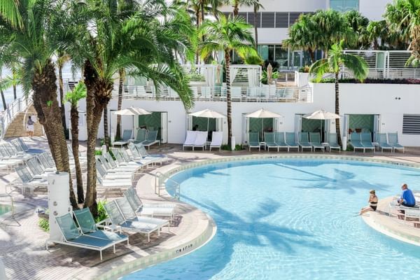 Sunbeds by the outdoor pool area at The Diplomat Resort