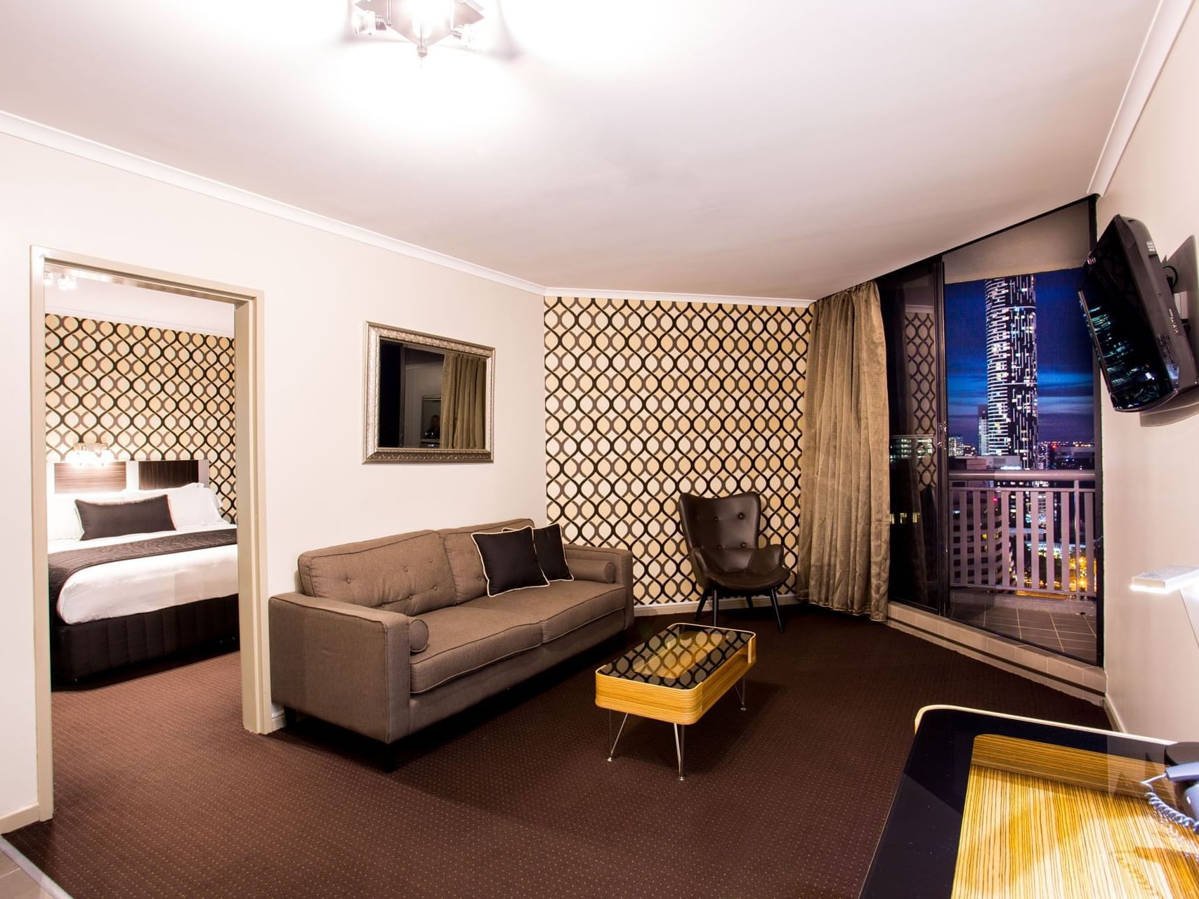 Superior Suite with night view at Grand Chancellor Brisbane