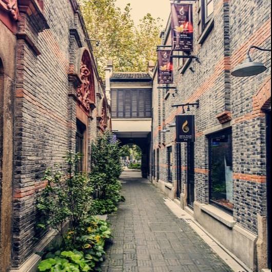 A walkway through through the cafes at Amara Hotels