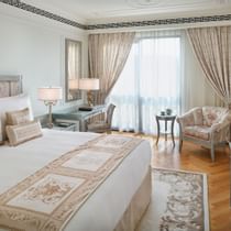 Residence Bedroom with sofa & TV at Palazzo Versace Dubai