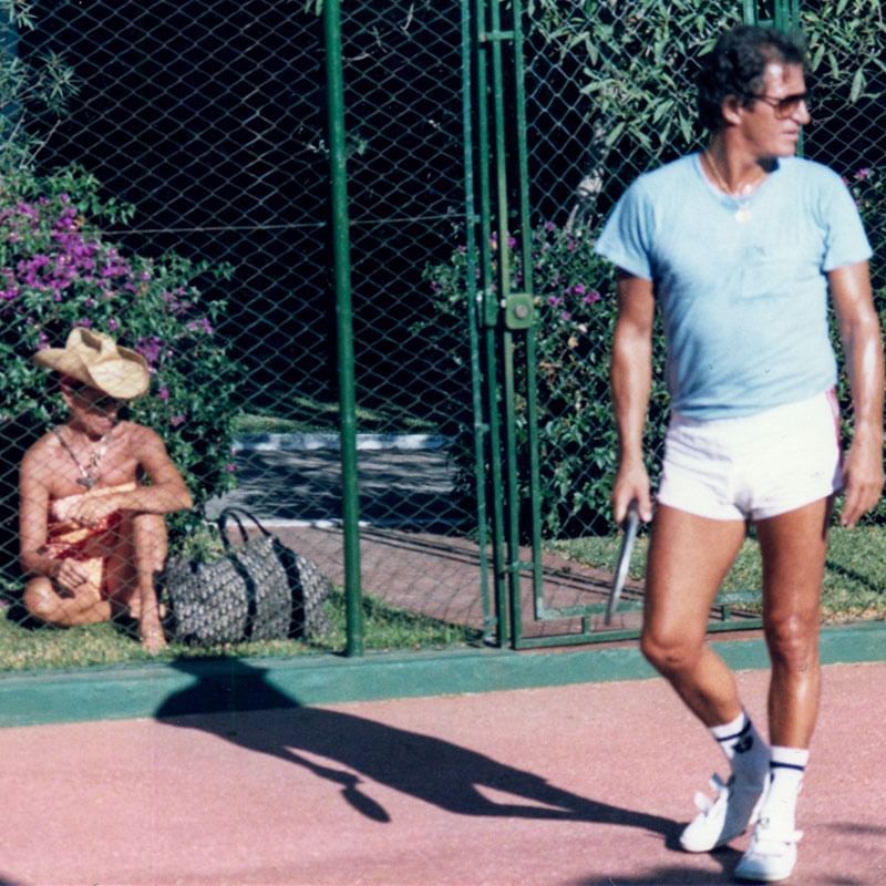 A man holding a tennis racket at Marbella Club in 1977