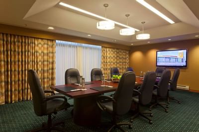 Conference table setup for a meeting at UMass Lowell Inn