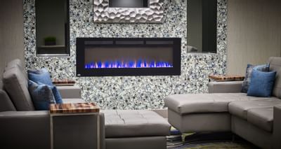 Fire place of lobby area at Waterfront Hotel Burlington