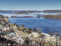 Aerial view of the river from a hilltop in Bellevue State Park with a mountain backdrop near Off Shore Resort