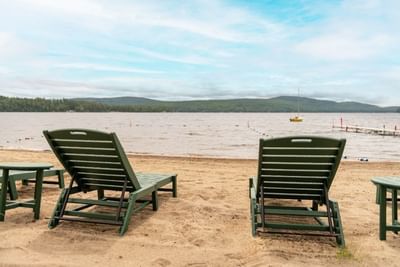 Private beach area with loungers in The Lodge at Schroon Lake