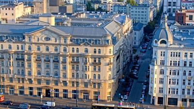 Aerial of city buildings along with streets near Polonia Palace Hotel