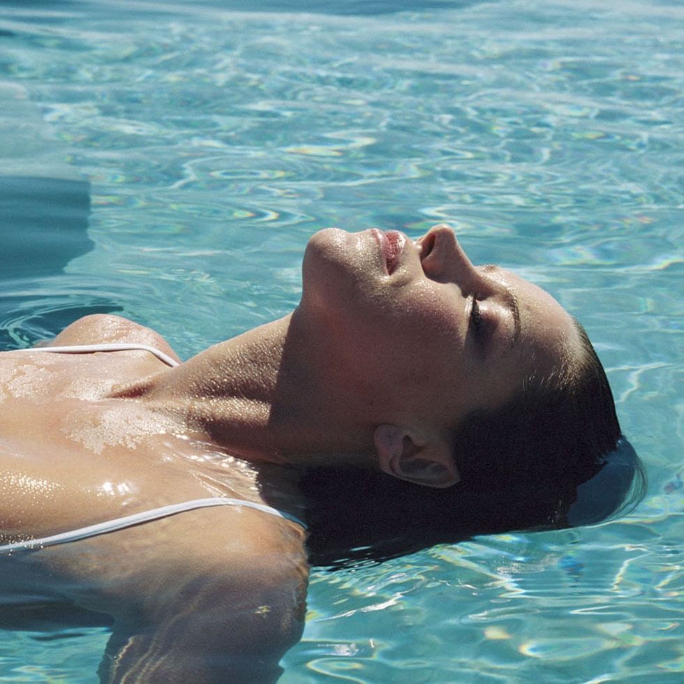 Lady relaxing in Swimming Pool at Falkensteiner Spa Resort Mariánské Lázně