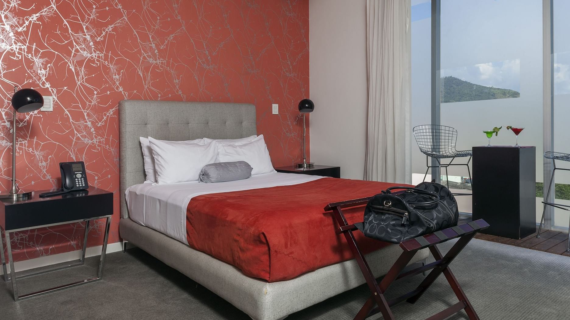 Bedroom arrangement in Deluxe King room at Gamma Morelia Beló