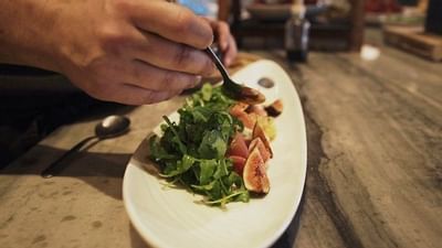 a chef plating up a dish