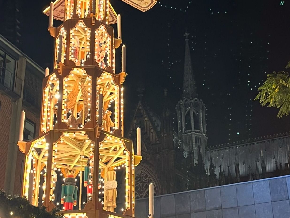 Illuminated Christmas pyramid at Cologne Zoo near Classic Hotel Harmonie