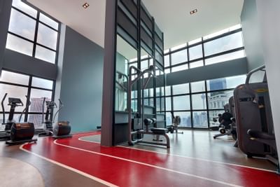 Fully equipped gymnasium at Tribeca Serviced Suites